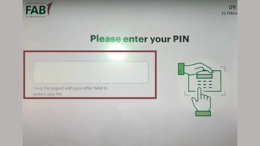 “ATM screen displaying a message asking the user to enter their PIN, with an illustration showing how to cover the keypad for security.”