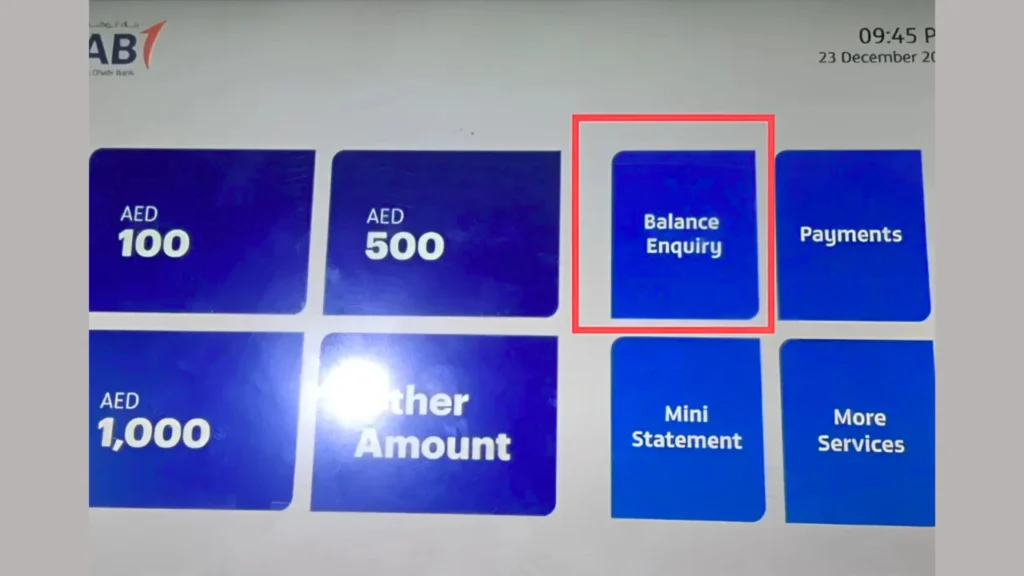 "FAB Bank ATM screen showing options including AED 100, AED 500, Balance Enquiry, Payments, and Mini Statement."